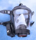 Survivair Full Face Respirator Mask With Voice Amplifier - Scratches On Lens. Fixed Price $34.00.